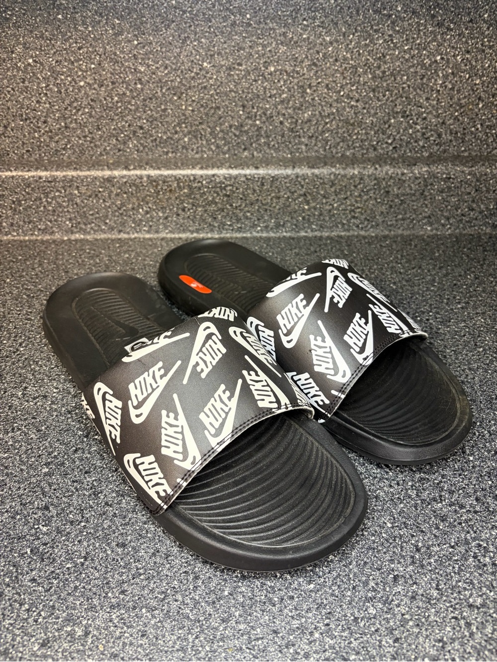 Nike Black Slide Sandals with White Logo Pattern